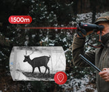 Guide TN650L thermal binocular eyepiece view showing the integrated laser rangefinder readout with distance, compass heading, and inclination data