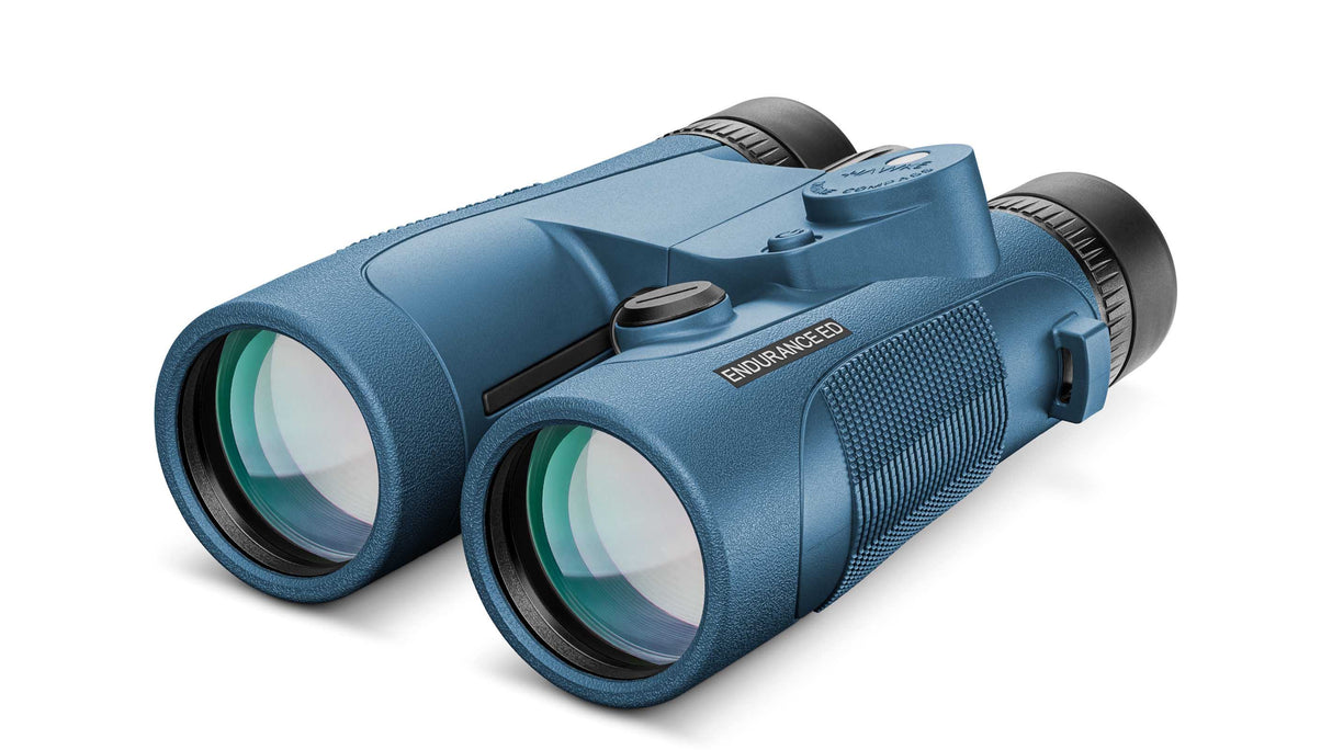 Hawke Endurance ED Marine 7x50 Compass binocular in blue, showing the illuminated compass module on the bridge