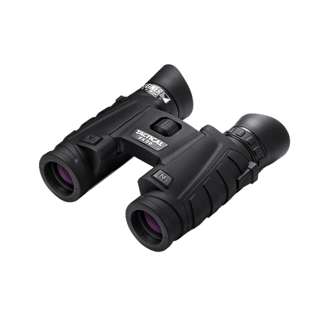 Steiner Tactical T824 8x24 compact binocular, three-quarter view showing the folding double-hinge body and TACTICAL 8x24 marking