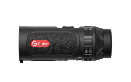 Guide TE211 thermal monocular held in hand showing the pocketable scanner ergonomics