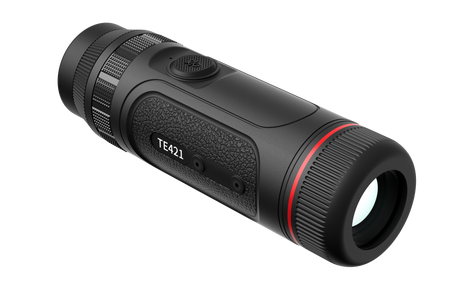 Guide TE421 thermal monocular in hand showing the pocket-sized 295 gram form factor
