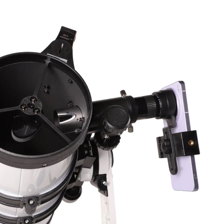Sidara Nano 114 open tube end showing the secondary mirror, with a smartphone in the eyepiece clip adapter